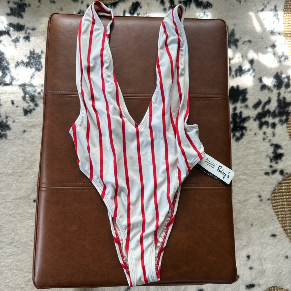 NWT Dippin Daisys One Piece 

Size Small